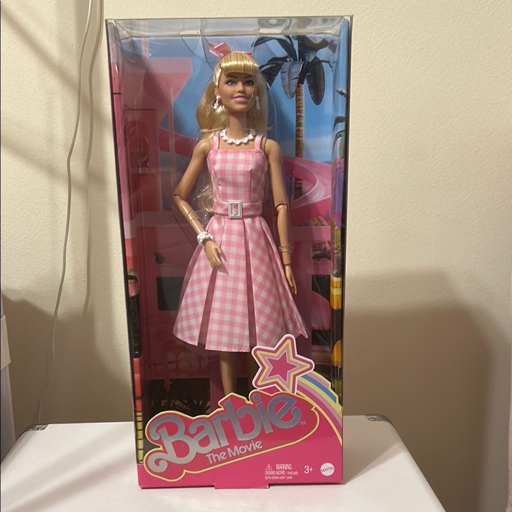 Barbie The Movie Doll in Pink Gingham Dress